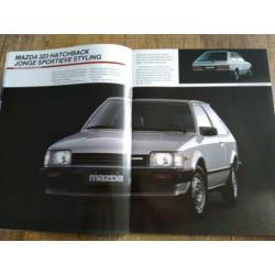 Mazda 323 hatchback/sedan folder uit 1984