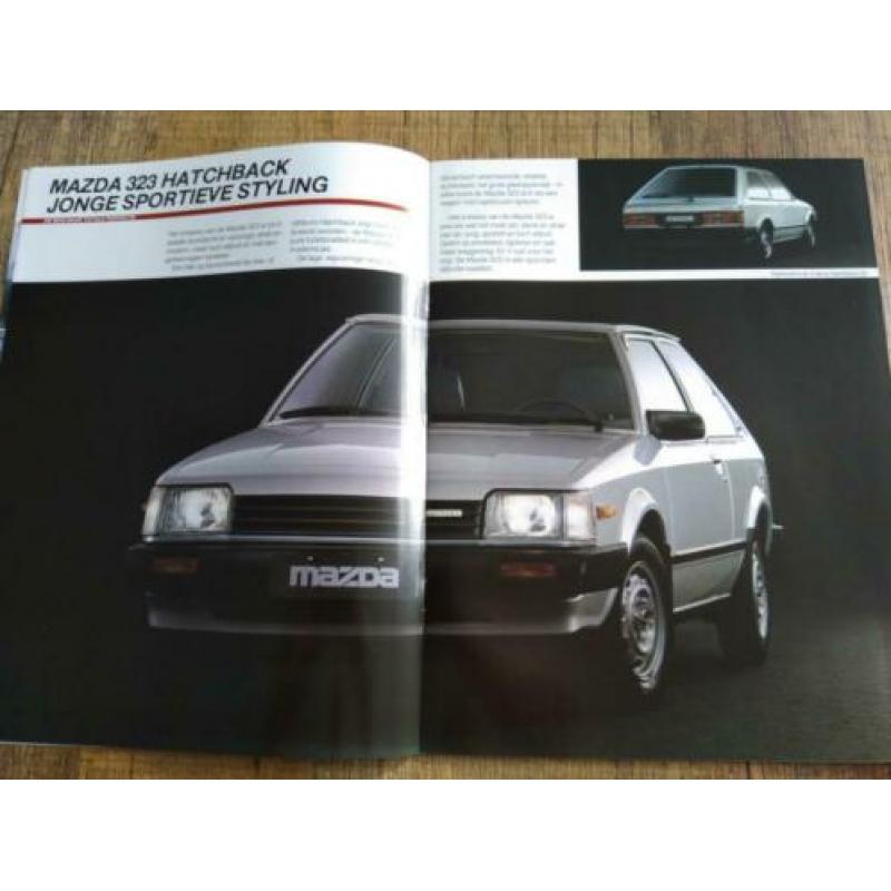 Mazda 323 hatchback/sedan folder uit 1984