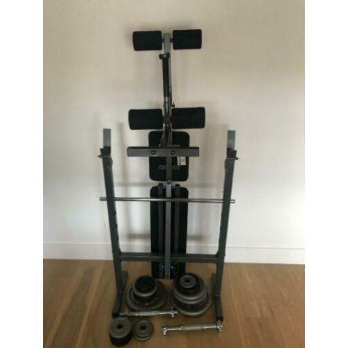 Halterbank met dumbbells