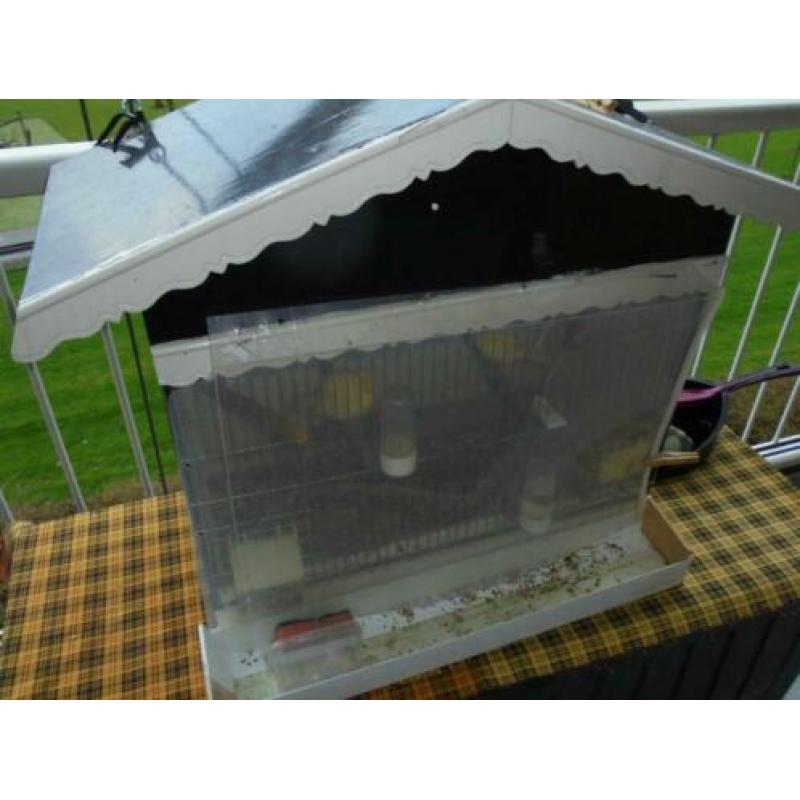 wie wil de een vogelhok kopen 25euro eneenpop kanarie 7.50