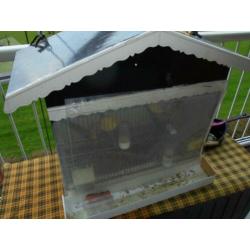 wie wil de een vogelhok kopen 25euro eneenpop kanarie 7.50