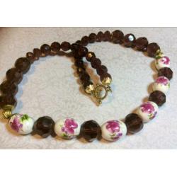Ketting grote kristallen en keramiek bloemen wijnrood