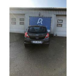 OPEL Corsa 1.2 16V 3D Cosmo met half leder bekleding