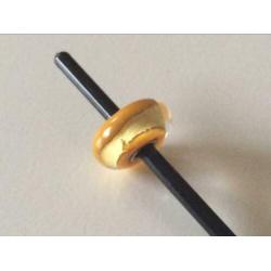 Trollbeads kracht chakra, geel met bladgoud.