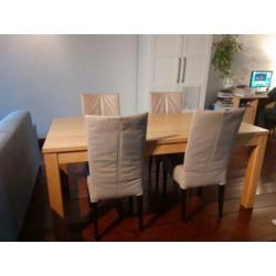 Eiken houten tafel en 4 leren stoelen