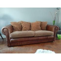 2 1/2 zits bruin half leren/ stoffen bank
