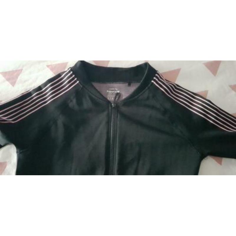 Positie sport-fitness outfit. Maat S/M