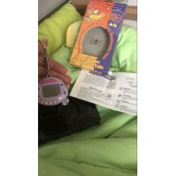 Hitorikko chicken tamagotchi lila 1997 **ZELDZAAM** Nieuw!