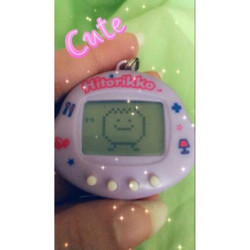Hitorikko chicken tamagotchi lila 1997 **ZELDZAAM** Nieuw!