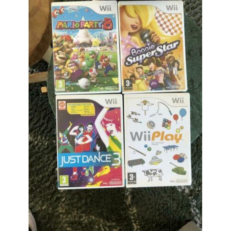 Nintendo Wii + 4 spellen