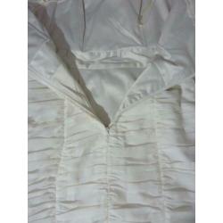Witte jurk met draperie van H&M Conscious Collection
