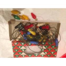 Oude antieke kerstlampjes kerstverlichting kaarsjes gekleurd