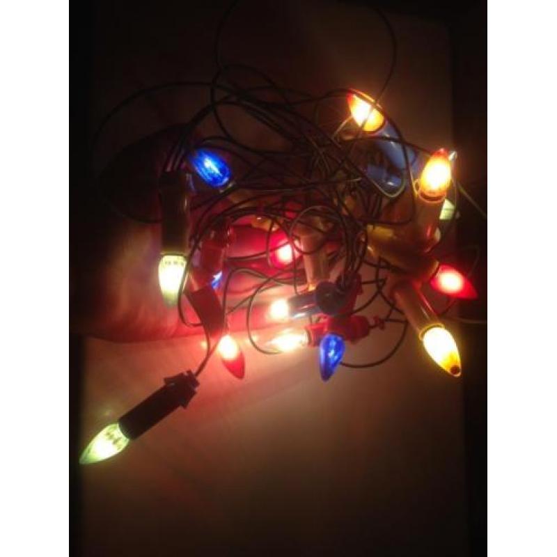 Oude antieke kerstlampjes kerstverlichting kaarsjes gekleurd