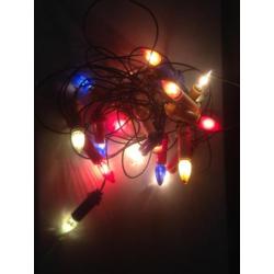 Oude antieke kerstlampjes kerstverlichting kaarsjes gekleurd