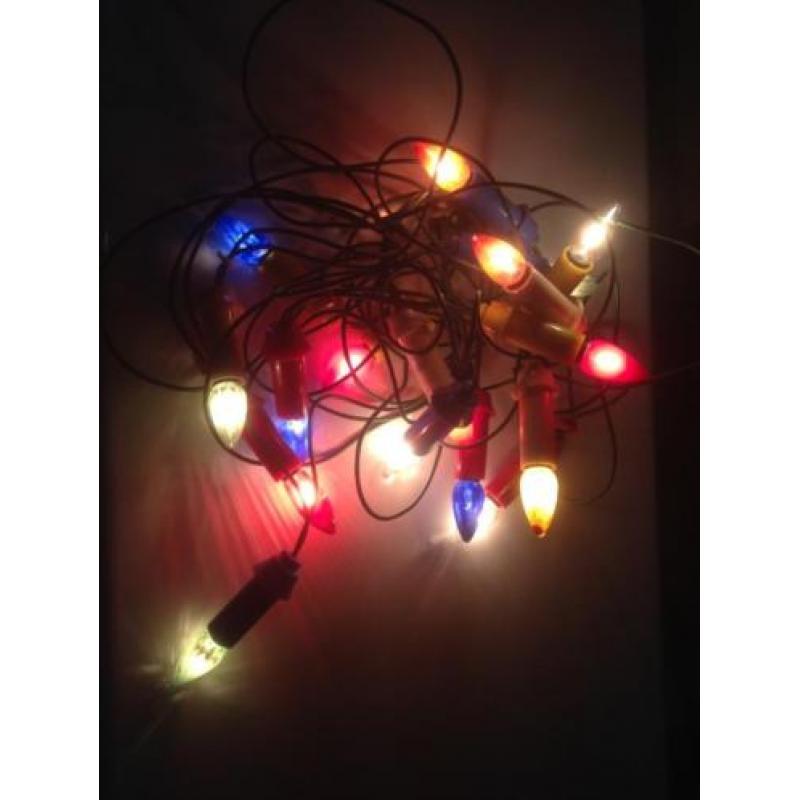 Oude antieke kerstlampjes kerstverlichting kaarsjes gekleurd
