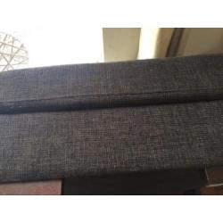 Hocker donkerbruin stof